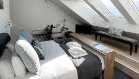 Photo de la chambre classique la Colombier de l'hôtel les Suites du Lac.