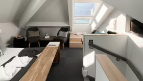 Photo de la chambre classique la Mémard de l'hôtel les Suites du Lac.