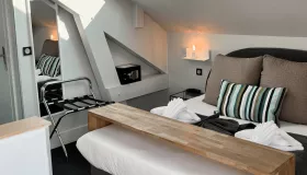 Photo de la chambre classique la Mémard de l'hôtel les Suites du Lac.